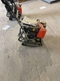 Husqvarna Plate Compactor,Plate Compactor,Plate Compactor in yard,Husqvarna Plate Compactor in yard